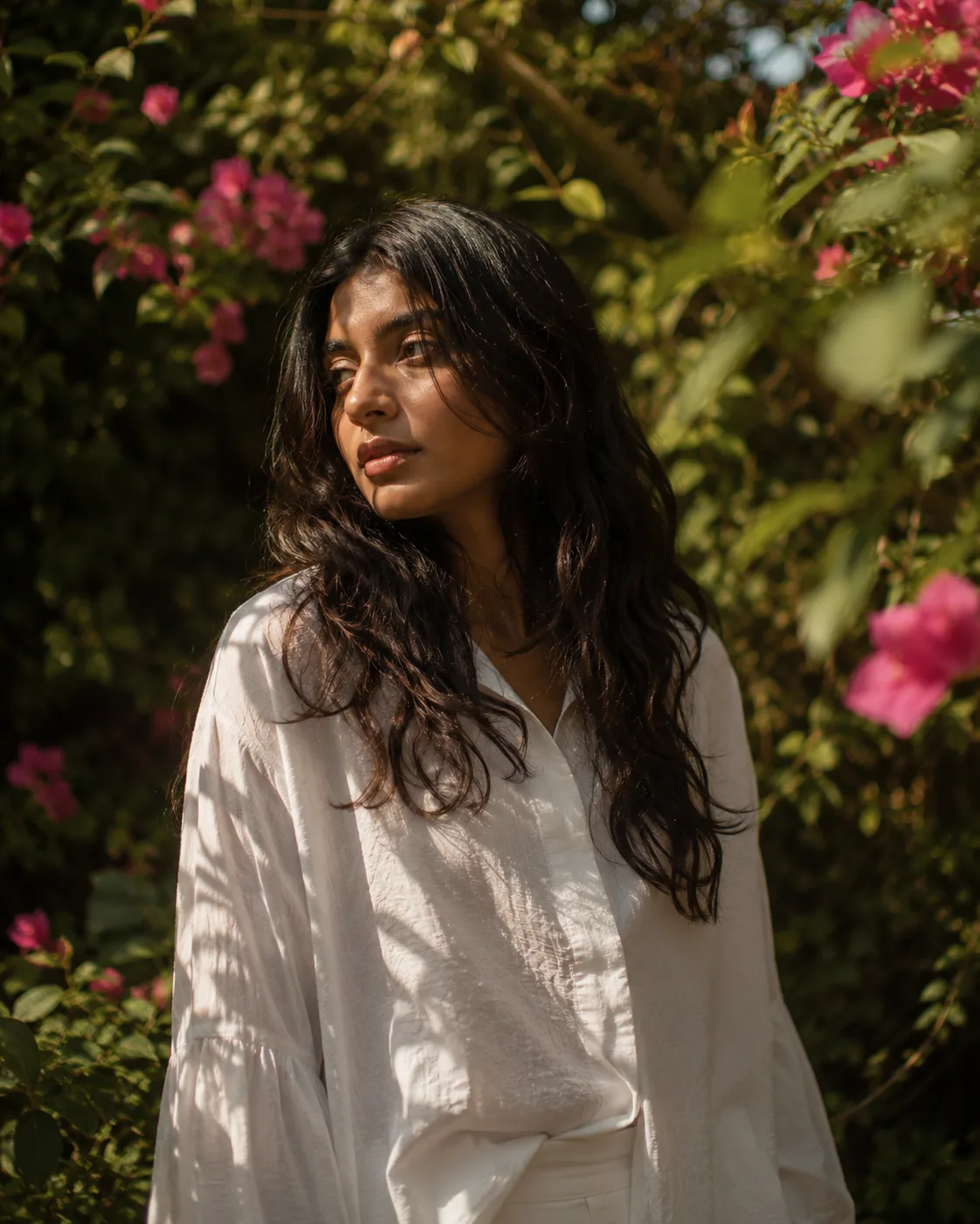Warping Theories — the shirt worn, bougainvillea behind